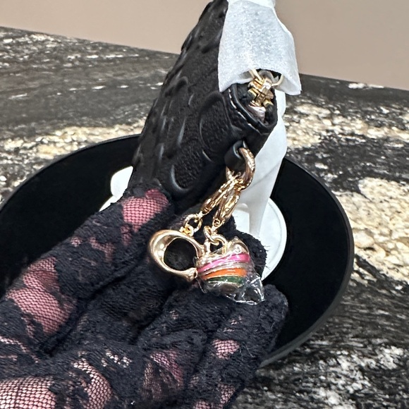 Coach Embossed Wristlet - Picture 3 of 11